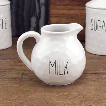 White Dimples Ceramic Milk Jug With Handle