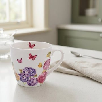 Butterfly Blossom Ceramic Mug by Jennifer Rose